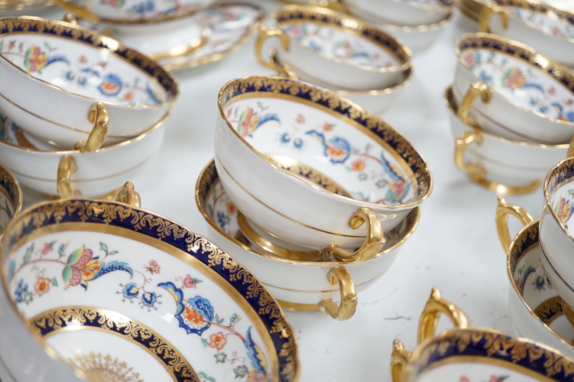 An extensive Paragon bone china dinner service to include tureens, plates and sauce boats. Condition - fair to good